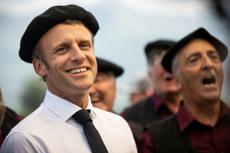 French President Emmanuel Macron reacts during a visit focused on pastoralism in Argeles-Gazost, southern France, July 21, 2022. Lionel Bonaventure/Pool via REUTERS