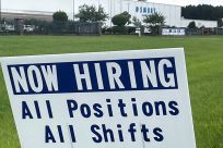 A sign advertising jobs stands near the SMART Alabama, LLC auto parts plant and Hyundai Motor Co. subsidiary, in Luverne, Alabama U.S. July 14, 2022. 