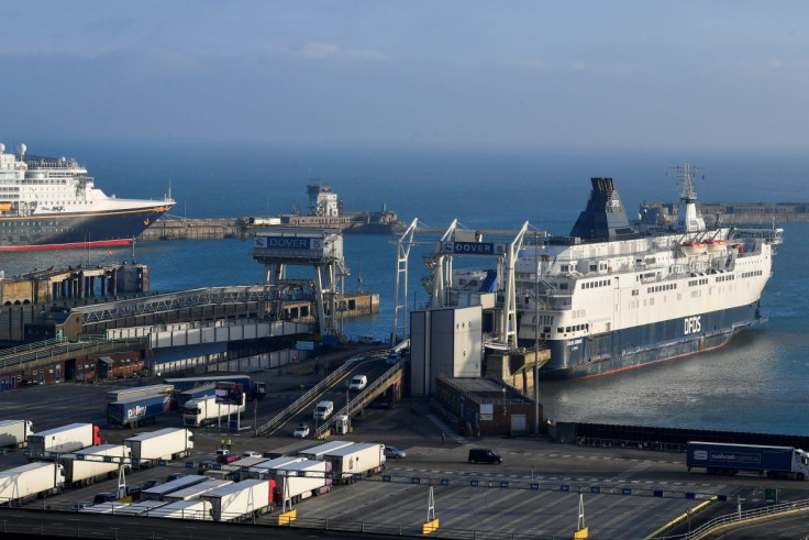 Vehicles disembark from a cross-channel ferry in the Port of Dover, following the coronavirus disease (COVID-19) outbreak, in Dover, Britain December 31, 2020.