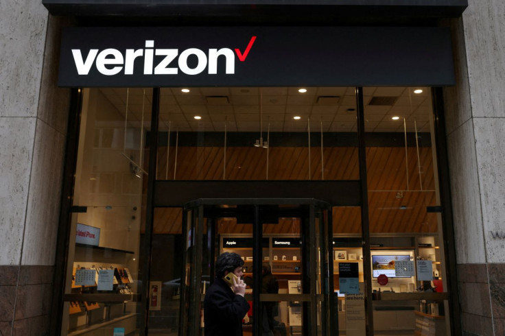 A person walks by a Verizon store in Manhattan, New York City, U.S., November 22, 2021. 