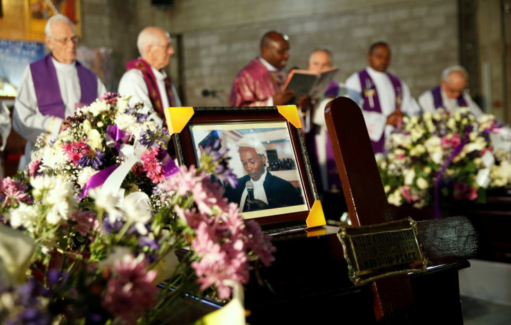 The casket with the remains of human rights lawyer Willie Kimani, who was abducted and killed alongside taxi driver Joseph Muiruri and client Josephat Mwendwa, is seen during their requiem mass at the Consolata Shrine in Westlands Nairobi, Kenya, July 8,