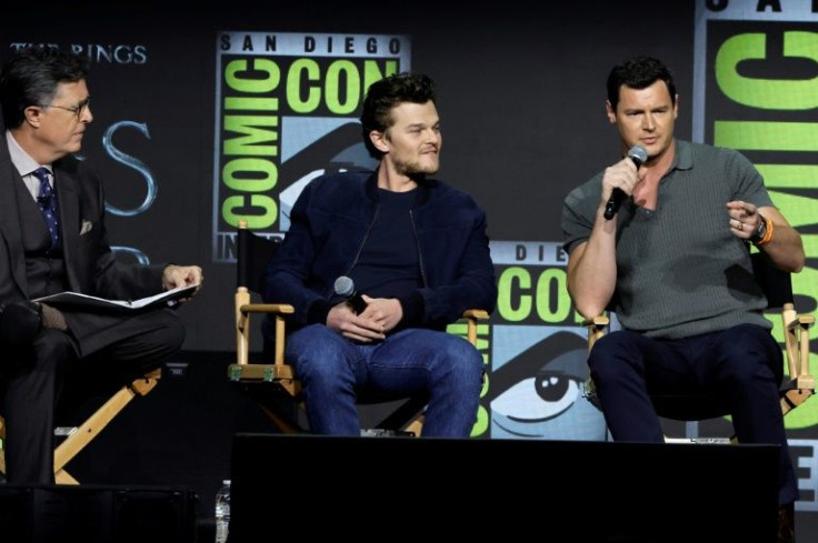 US comedian Stephen Colbert interviews Robert Aramayo, who will play a young Elrond, and co-star Benjamin Walker at Comic-Con's "The Lord of the Rings: The Rings of Power" panel
