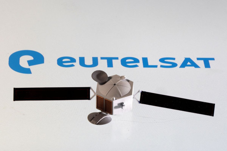 A satellite model is placed on Eutelsat logo in this picture illustration taken April 4, 2022.
