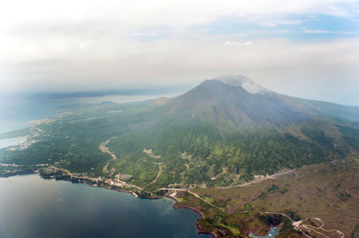 An aerial view shows Mt. Sakurajima in Kagoshima, southwestern Japan, in this photo taken by Kyodo August 15, 2015. Japan warned on Saturday that the volcano, 50 km (31 miles) from a just-restarted nuclear reactor, is showing signs of increased activity, 