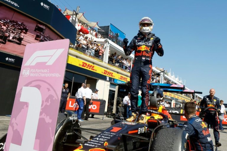 Max Verstappen celebrates after securing his seventh victory of the season