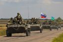 An armoured convoy of Russian troops drives in Russian-held part of Zaporizhzhia region, Ukraine, July 23, 2022.  
