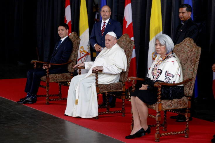 Canada's Prime Minister Justin Trudeau, Pope Francis and Governor General of Canada Mary Simon attend a welcome ceremony after the pope arrived at Edmonton International Airport, near Edmonton, Alberta, Canada July 24, 2022. 