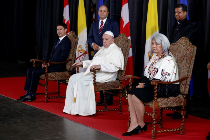 Canada's Prime Minister Justin Trudeau, Pope Francis and Governor General of Canada Mary Simon attend a welcome ceremony after the pope arrived at Edmonton International Airport, near Edmonton, Alberta, Canada July 24, 2022.