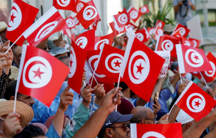 People take part in a protest against President Kais Saied's referendum on a new constitution, in Tunis, Tunisia, July 23, 2022. 