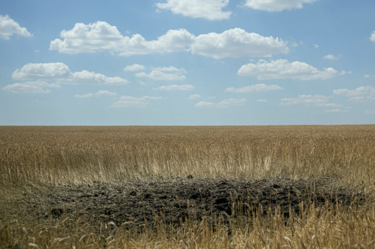 The impact of a mortar is seen in a field where members of the Carpathian Sich battalion are fighting, at the frontline in Kharkiv region, Ukraine, July 1, 2022.