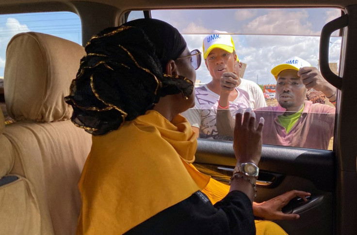 Umra Omar, Lamu's gubernatorial candidate under Safina party listens to her supporters during her campaign tour in Lamu, Kenya June 16, 2022.