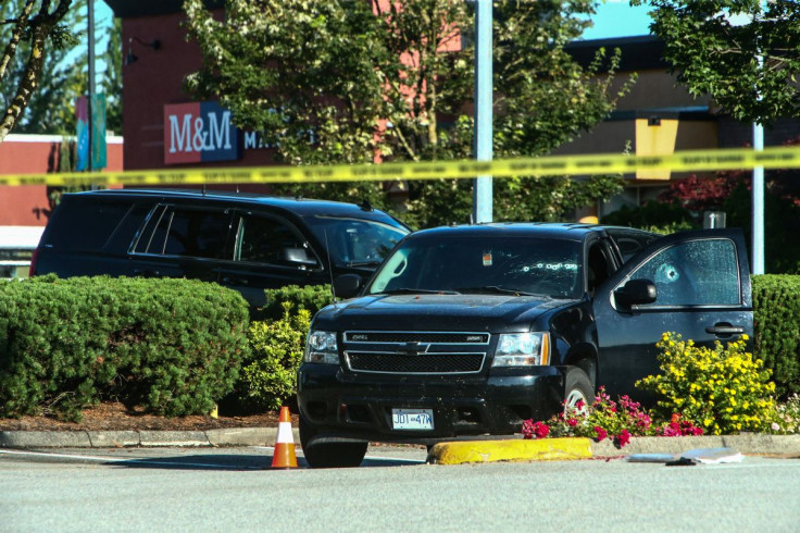 A car with bullet holes visible on the windshield is seen at the site after authorities alerted residents of multiple shootings targeting transient victims in the Vancouver suburb of Langley, British Columbia, Canada July 25, 2022.  