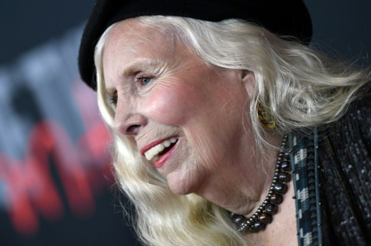 Joni Mitchell, shown at the MusiCares gala in April 2022, surprised fans with a set at the Newport Folk Festival