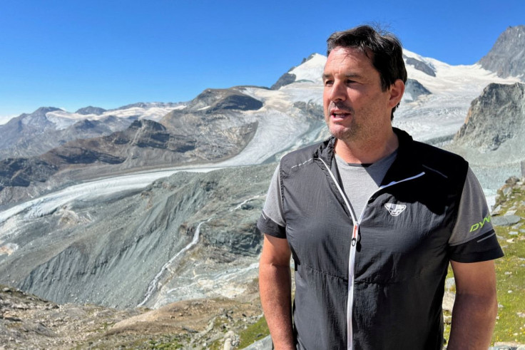 Host Dario Andenmatten of the Britannia Hut refuge talks during an interview with Reuters near the Alpine resort of Saas-Fee, Switzerland July 19, 2022.  