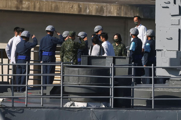 Taiwan's President Tsai Ing-wen walks on board a DDG-1801 as part of Taiwan's main annual "Han Kuang" exercises, as 20 naval vessels including frigates and destroyers fired shells to simulate intercepting and attacking an invading force, off Taiwan's nort