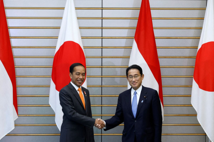 Joko Widodo, Indonesia's President, and Fumio Kishida, Japan's Prime Minister, shake hands during a summit meeting at the prime minister's official residence in Tokyo, Japan, July 27, 2022. Kiyoshi Ota/Pool via REUTERS
