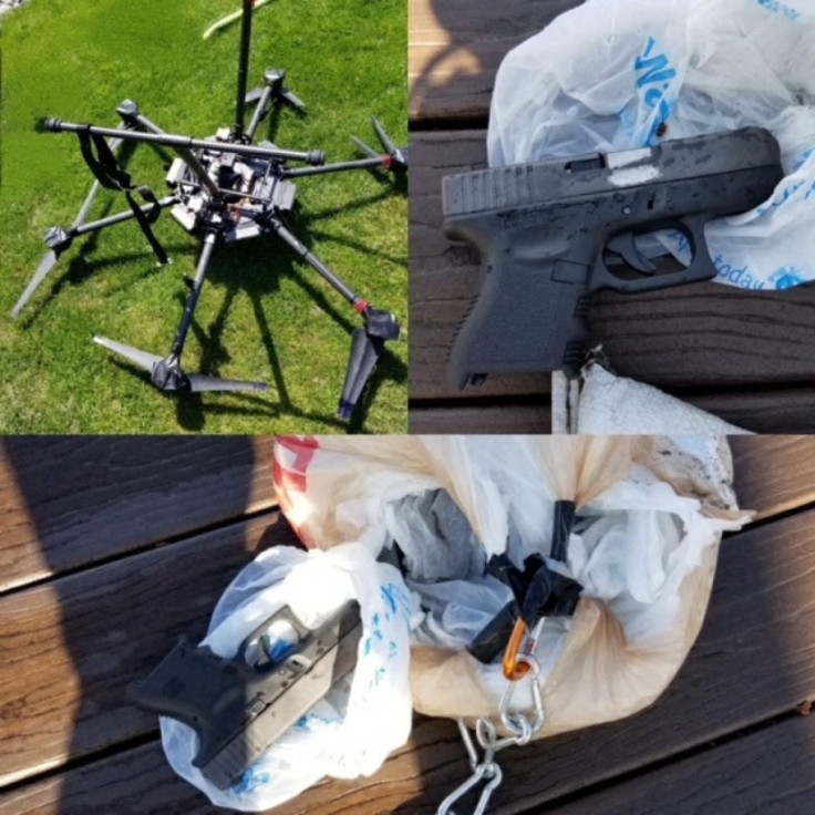 A combination handout photo shows a drone and a couple of the 11 handguns which the drone was carrying, after it was found in a tree in a backyard near Port Lambton, Ontario, Canada, at the end of April 2022.  Ontario Provincial Police/Handout via REUTERS