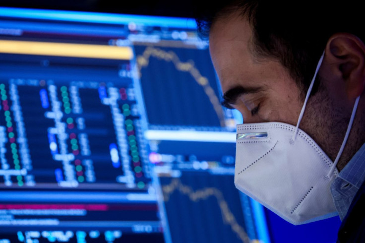 A Specialist Trader works inside his post on the floor of the New York Stock Exchange (NYSE) in New York City, U.S., January 21, 2022.  