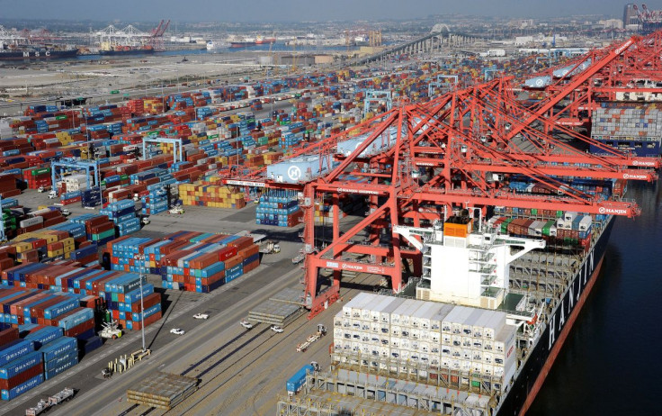 Cranes and containers are seen at the Ports of Los Angeles and Long Beach, California February 6, 2015 in this aerial image.  