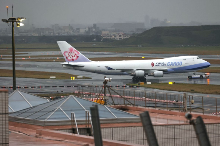 A China Airlines Cargo plane taxis at the Taiwan Taoyuan International Airport in Taoyuan, Taiwan, January 7, 2021.