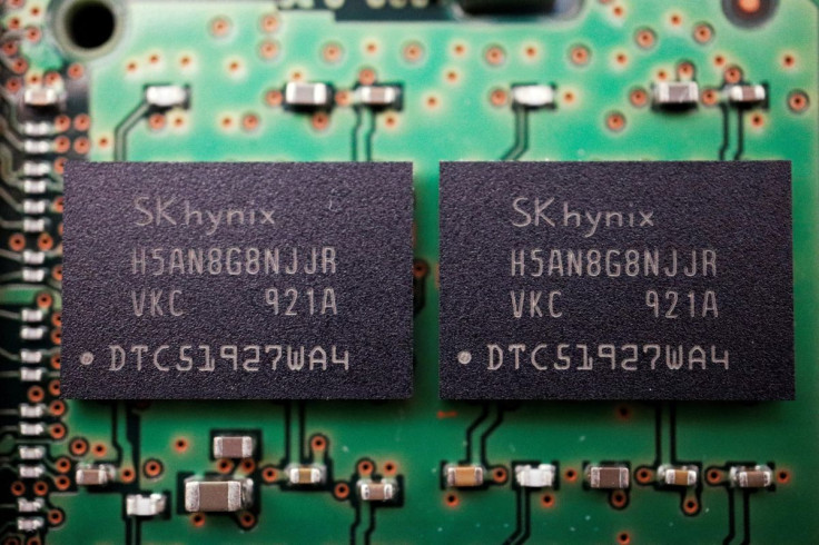 Memory chips by South Korean semiconductor supplier SK Hynix are seen on a circuit board of a computer in this illustration picture taken February 25, 2022. 