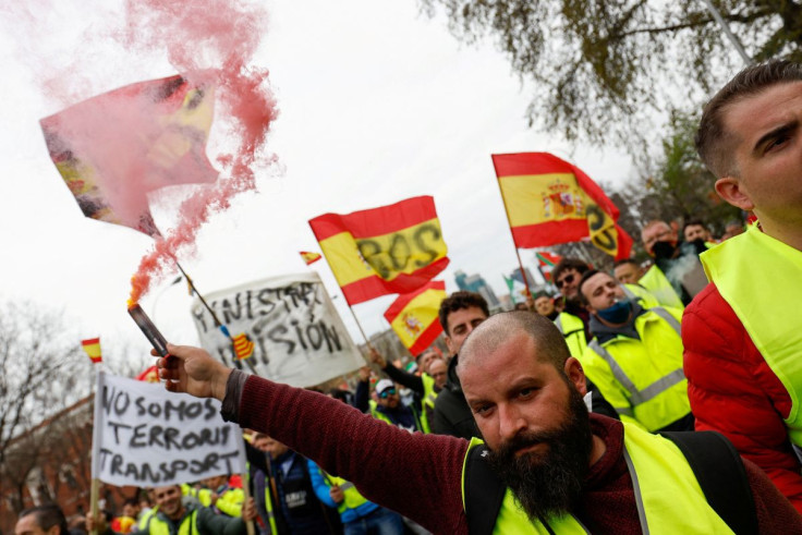 Striking truck drivers protest over high fuel prices and working conditions in Madrid, Spain, March 25, 2022. 