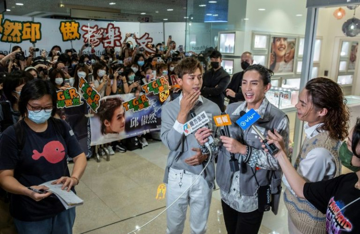 Members of the popular band Mirror during an event at a shopping mall in Hong Kong
