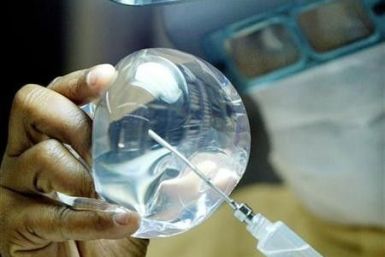 A laboratory worker checks silicone for implants in Rio de Janeiro, in a file photo.