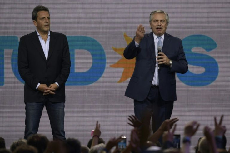 Argentina's President Alberto Fernandez (R) has named lawmaker Sergio Massa (L) to be a new economy 'super minister'