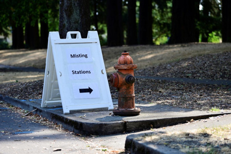 A sign sits at the entrance to Mt Scott park as a heat wave continues in Portland, Oregon, U.S., August 12, 2021.  