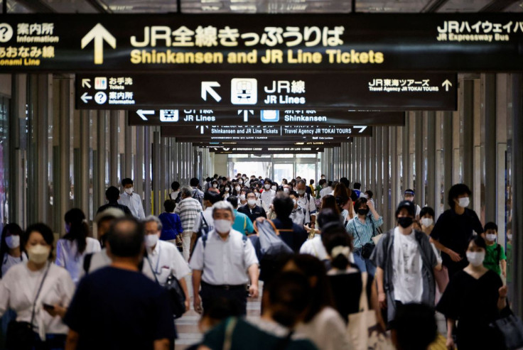 Passengers and passersby wearing protective face masks walk on the concourse, amid the coronavirus disease (COVID-19) pandemic, at Nagoya station in Nagoya, Japan, July 21, 2022.  