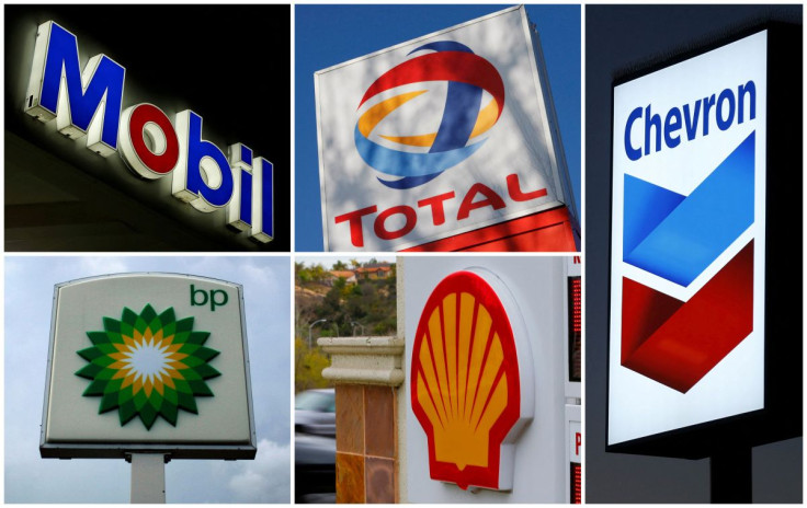 A combination of file photos shows the logos of five of the largest publicly traded oil companies; BP, Chevron, Exxon Mobil, Royal Dutch Shell, and Total.  