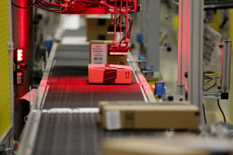 Packaged products are scanned at an Amazon Fulfilment Center in Tracy, California, August 3, 2015. 