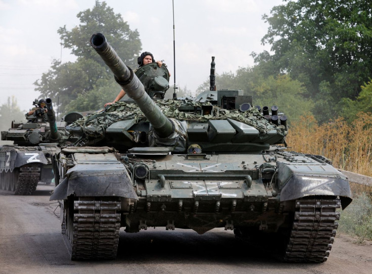 Service members of pro-Russian troops drive tanks in the course of Ukraine-Russia conflict near the settlement of Olenivka in the Donetsk region, Ukraine July 29, 2022. 