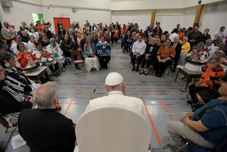 Pope Francis attends a meeting with former students of residential schools at the Nakasuk Elementary School in Iqaluit, Canada July 29, 2022. Vatican Media/Â­Handout via REUTERS