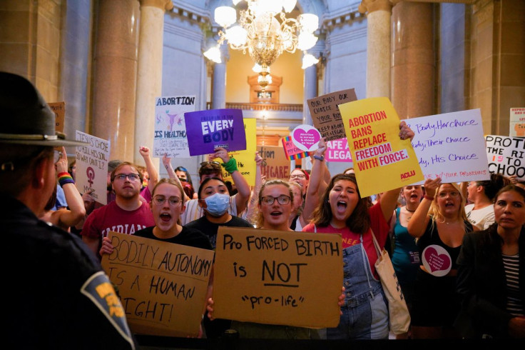 Activists protest outside the senate chambers in the Indiana Statehouse during a special session debating on banning abortion in Indianapolis, Indiana, U.S. July 25, 2022. 