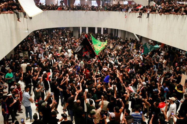 Supporters of cleric Moqtada Sadr cheer after entering Iraq's parliament for the second time in three days