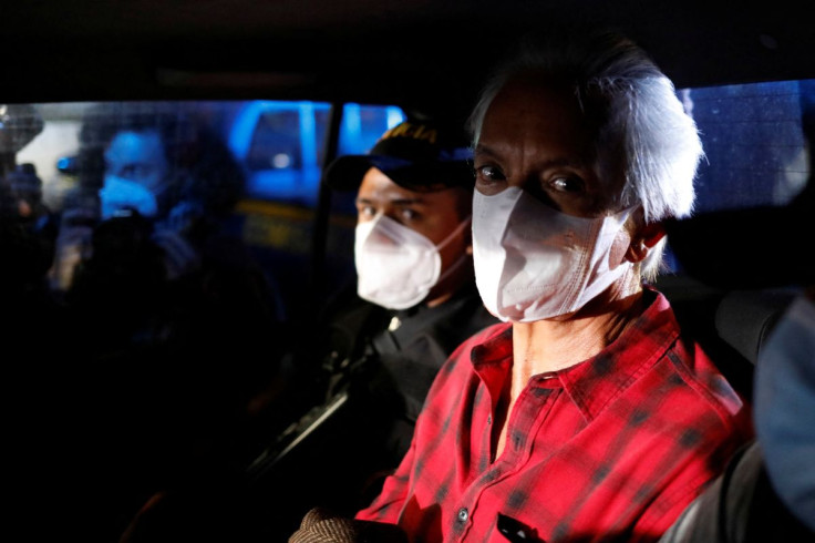 Police officers escort Guatemalan journalist Jose Ruben Zamora, founder and president of newspaper El Periodico after being detained by Guatemalan authorities, in Guatemala City, Guatemala July 29, 2022.