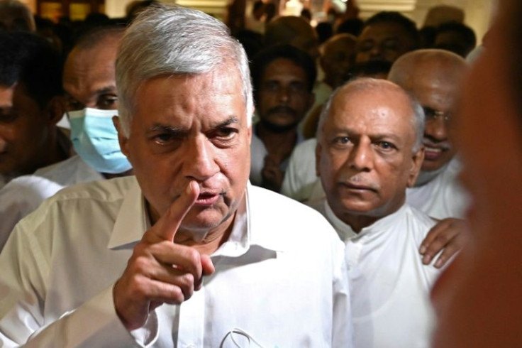 Sri Lanka's new president Ranil Wickremesinghe has written to all lawmakers asking them to join a unity government