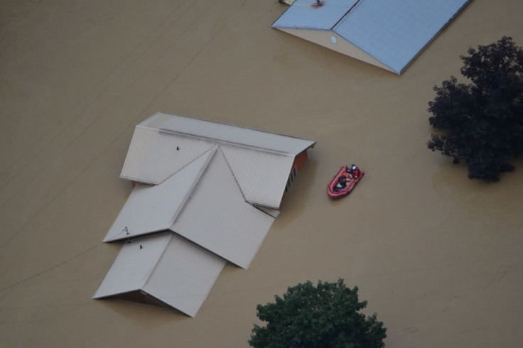 A flooded area is flown over by a Kentucky National Guard helicopter deployed in response to a declared state of emergency in eastern Kentucky, U.S. July 27, 2022. U.S. Army National Guard/Handout via REUTERS 