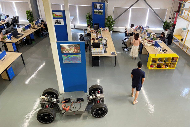Employees work at the office of autonomous technology company Whale Dynamic in Shenzhen, Guangdong province, China July 28, 2022. 