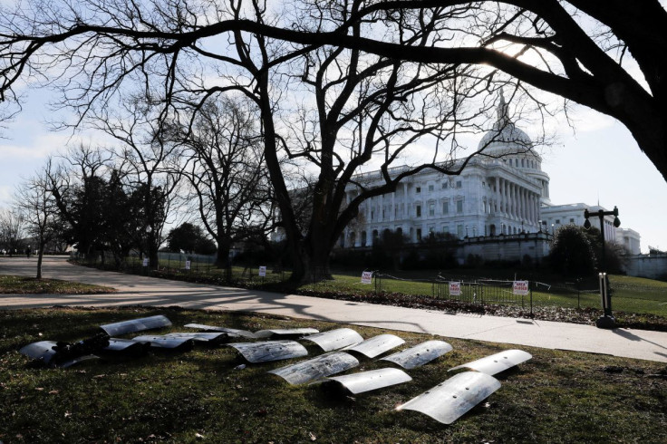 U.S. National Guard riot shields are laid out at the ready outside the U.S. Capitol Building on Capitol Hill in Washington, U.S., January 13, 2021.  
