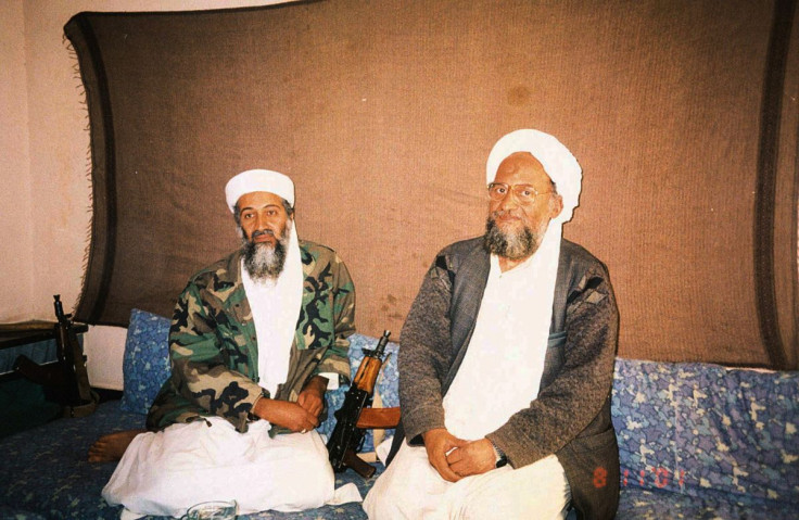 Osama bin Laden sits with his adviser Ayman al-Zawahiri, an Egyptian linked to the al Qaeda network, during an interview with Pakistani journalist Hamid Mir (not pictured) in an image supplied by Dawn newspaper November 10, 2001.  Hamid Mir/Editor/Ausaf N