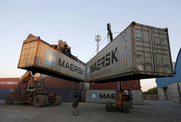 Mobile cranes prepare to stack containers at Thar Dry Port in Sanand in the western state of Gujarat, India, February 10, 2016.