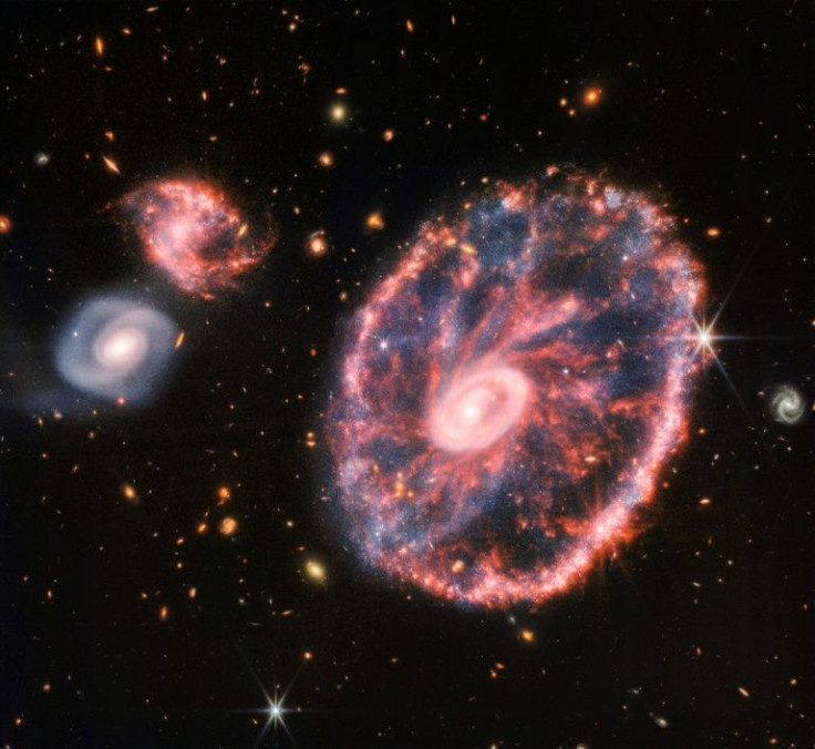 The Webb telescope's image of the Cartwheel Galaxy, which was once shrouded in mystery due to dust
