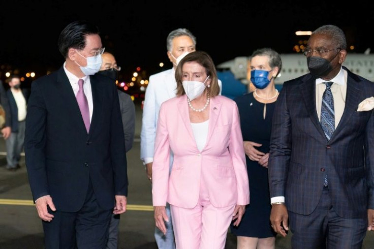 This picture taken and released by Taiwan's foreign ministry shows US House Speaker Nancy Pelosi being welcomed upon her arrival in Taipei
