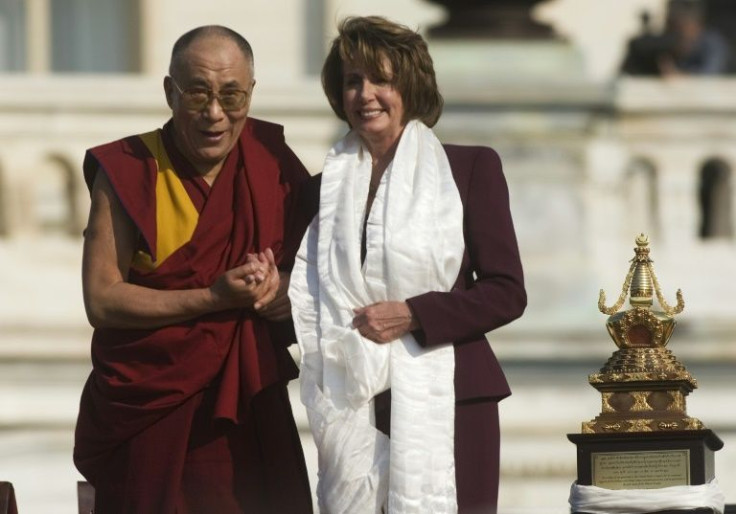 Speaker of the House Nancy Pelosi poses with the Dalai Lama in front of the US Capitol in Washington in 2007