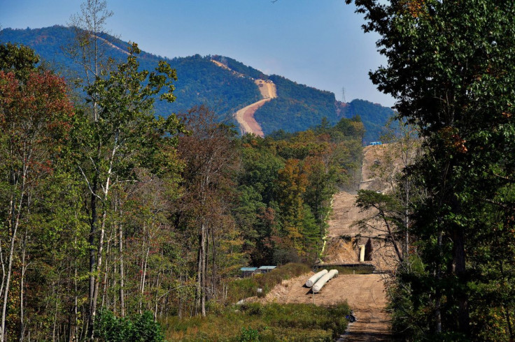Workers construct the Mountain Valley Pipeline near Elliston, Virginia, U.S. September 30, 2019. Picture taken September 30, 2019. 
