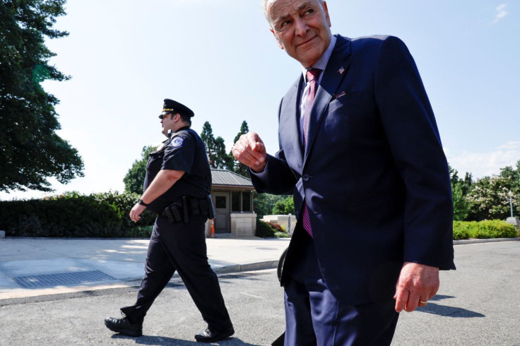 U.S. Senate Majority Leader Chuck Schumer (D-NY) returns to the Senate after speaking with activists about a breakthrough with Republicans to allow a vote on a bill to expand healthcare to veterans exposed to toxic burn pits while serving abroad, at the U