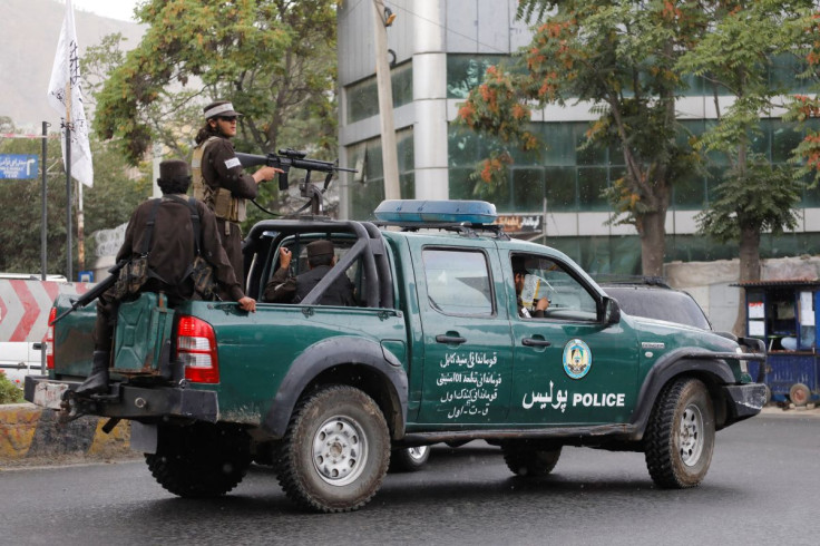 Taliban fighters drive a car on a street following the killing of Al Qaeda leader Ayman al-Zawahiri in a U.S. strike over the weekend, in Kabul, Afghanistan, August 2, 2022. 